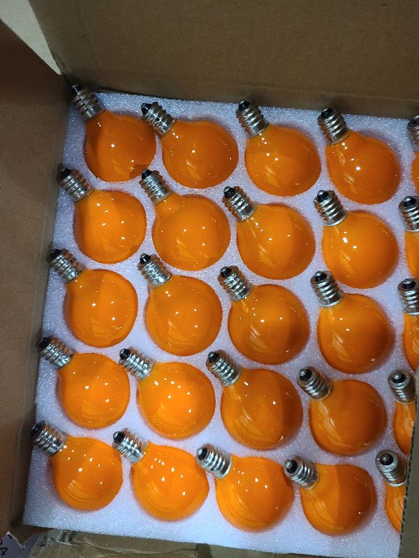 Photo 1 of Jasneniebo 25 Pack G40 Orange Halloween Replacement Light Bulb, G40 Orange Christmas Lights Bulbs for Halloween Outdoor Patio String Lights, E12 Candelabra Base Night Light Bulbs, 5 Watt, 120 Volt