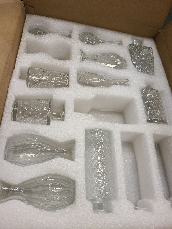 Photo 1 of 36pcs  Vases Set Small Vintage Glass Bottles Clear Bud Vases in Bulk Multiple Shape Cute Glass Vases for Rustic Wedding Centerpieces Table Decorations and Home Decor(Clear)
