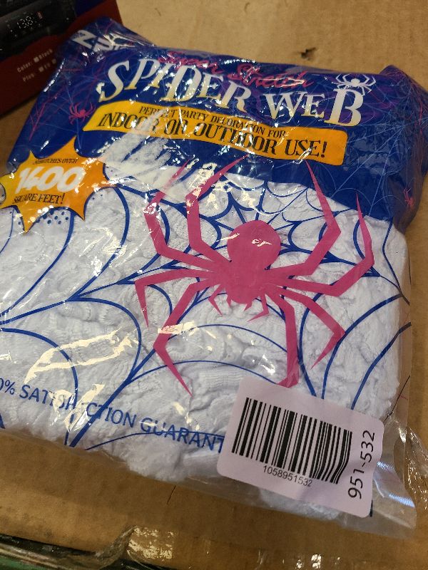 Photo 1 of 1400 sqft Halloween Spider Webs Decorations with 150 Extra Fake Spiders, Super Stretchy Cobwebs for Halloween Decor Indoor and Outdoor