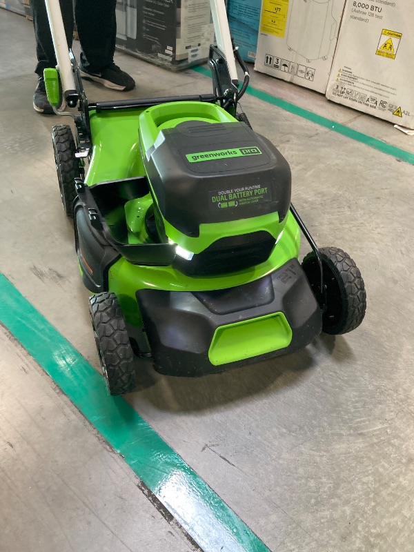 Photo 1 of **LAWN MOWER ONLY**
Greenworks 80V 21” Brushless (Push) Cordless Electric Lawn Mower + (500 CFM) Axial Leaf Blower (75+ Compatible Tools), (2) 2.0Ah Batteries and 30 Minute Rapid Charger
