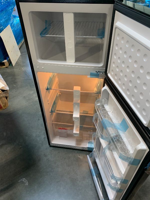 Photo 1 of ** wobbly, uneven footing**
Frigidaire EFR753, 2 Door Apartment Size Refrigerator with Freezer, Retro Chrome Handle, 7.5 cu ft, Platinum Series, Stainless steel, 7.5