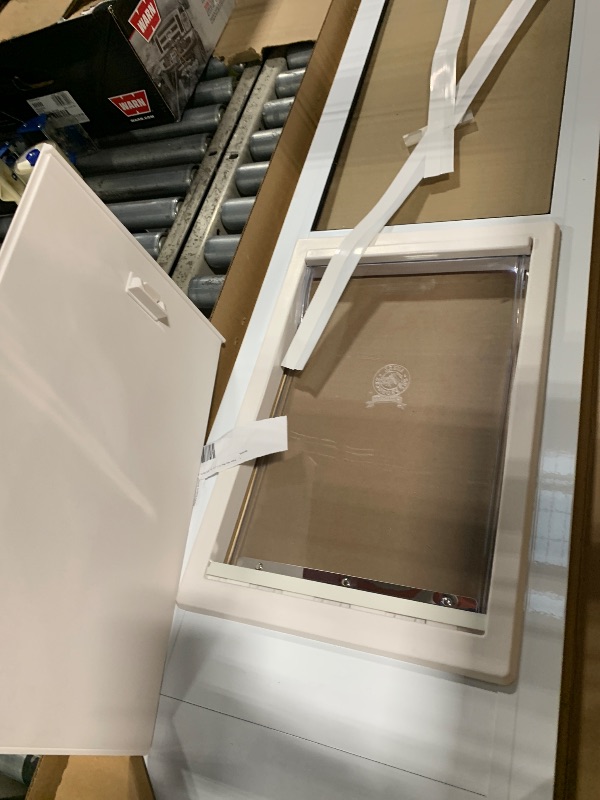 Photo 1 of ** missing hardware ans instructions**
Ideal Pet Products Aluminum Pet Patio Door, Adjustable Height 77-5/8" to 80-3/8", 10-1/2" x 15" Flap Size, White