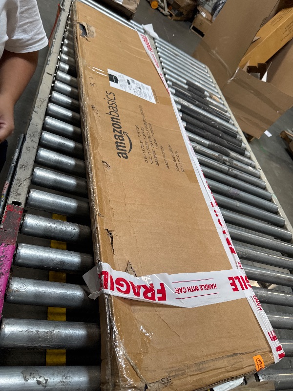 Photo 1 of ****BRAND NEW ITEM****** Amazon Basics Ironing Board Medium 122x38 cm with Iron Rest H Shape, Black, Floral