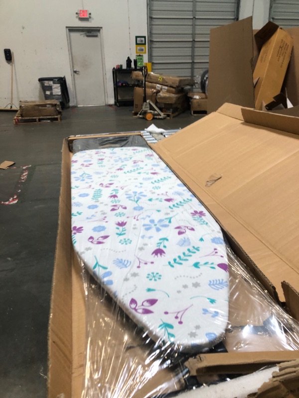 Photo 1 of ****BRAND NEW ITEM****** Amazon Basics Ironing Board Medium 122x38 cm with Iron Rest H Shape, Black, Floral
