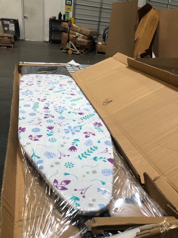 Photo 1 of ****BRAND NEW ITEM****** Amazon Basics Ironing Board Medium 122x38 cm with Iron Rest H Shape, Black, Floral
