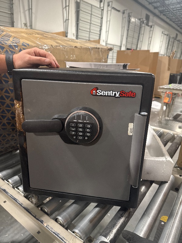 Photo 1 of *******OPENING CODE 41827 ******* VERY USED***** SentrySafe Black Fireproof Safe with Digital Push Button Keypad, Home Safe For Money, Documents, and other Valuables, 1.23 Cubic Feet, SF123ES