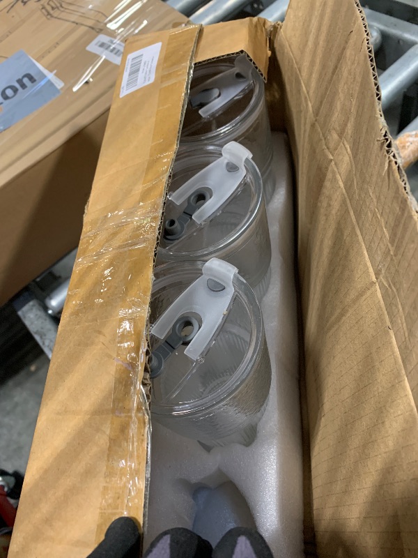 Photo 1 of *** a glass missing and straws as well*** TUZAZO 20 Oz Glass Tumblers with Lids and Straws - 4 Pack Embossed Glass Iced Coffee Cup with Straw and Lid, Thicken Glasses, Ideal for Smoothieds, Cocktails, and Juices