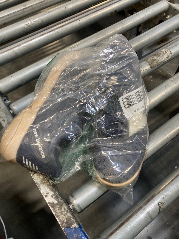 Photo 1 of **NEED A MAJOR CLEANING** New Balance Boy's 4040 V7 Rubber-Molded Baseball Shoe, Team Navy/Optic White, 4.5 Big Kid