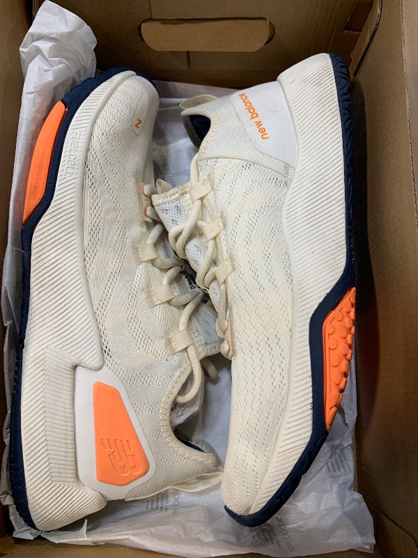 Photo 1 of ** A LITTLE DIRTHY** New Balance Men's FuelCell Trainer V2 Cross Trainer, Angora/Hot Mango/Nb Navy, 10 M