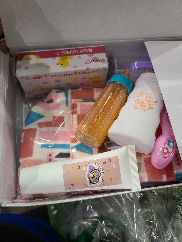Photo 1 of 14 Pack Baby Doll Accessories, Baby Doll Feeding and Caring Set Includes Diaper Bag, Doll Diapers, Magic Bottle, Changing Mat for Girl Toddler Kid, Babies Pretend Play Set for Birthday Gift Christmas