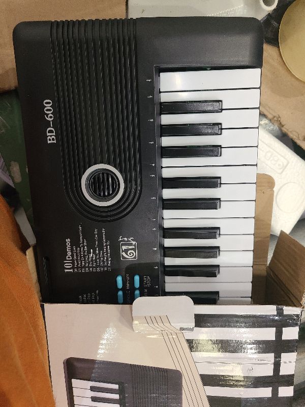 Photo 1 of 61 key keyboard Piano,Portable Electronic Digital Piano,Built In Dual Speakers,External Microphone,Power Plug,Rich Teaching Content,Multi-Functional Electronic Piano Suitable For Beginners (Black)