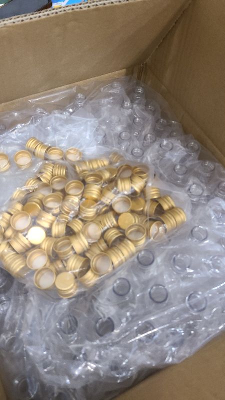 Photo 1 of 100 Pcs Mini Liquor Bottles Set, 1.7oz Plastic Shot Bottles with Caps, 6 Funnels, 100 Tags, and 65ft Ropes, Miniature Spirit Containers Bulk for Wedding Party Favors