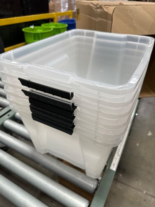 Photo 1 of *USED NO LIDS BROKEN*IRIS USA 32 Qt Stackable Plastic Storage Bins with Lids, 6 Pack - BPA-Free, Made in USA - See-Through Organizing Solution, Latches, Durable Nestable Containers, Secure Pull Handle - Clear