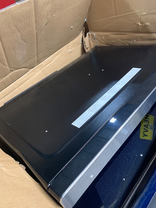 Photo 1 of (used)(please see all images) GE GCST10A1WSS 4-in-1 Microwave Oven, 1,050 Watts Air Fryer, Broiler & Convection Mode, Child-Lock Technology