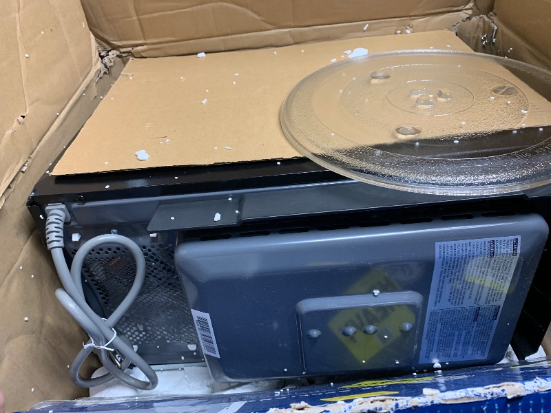 Photo 1 of (used)(please see all images) GE GCST10A1WSS 4-in-1 Microwave Oven, 1,050 Watts Air Fryer, Broiler & Convection Mode, Child-Lock Technology