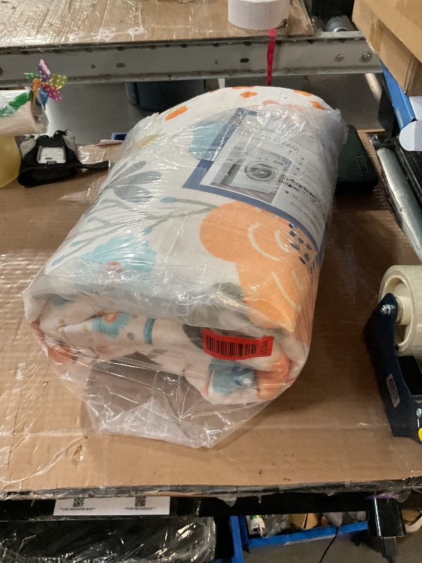 Photo 1 of (BAGGED) (USED/FAIR) RELEANY Floral 5x7 Area Rug Machine Washable Soft Print Boho Carpet Non Slip Doormat Low Pile Flower Area Rugs for Living Room Bedroom Nursery Kitchen Dining Room Indoor-Beige/White/Orange