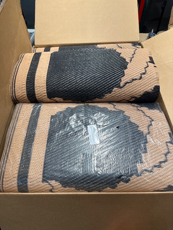Photo 1 of (used/fair) LBRO2M Waterproof Outdoor Rugs 9X12 for Patio Outdoor Plastic Straw Rug Reversible Outdoor Camping Rug for RV, Deck, Beach (9X12 Black Brown)