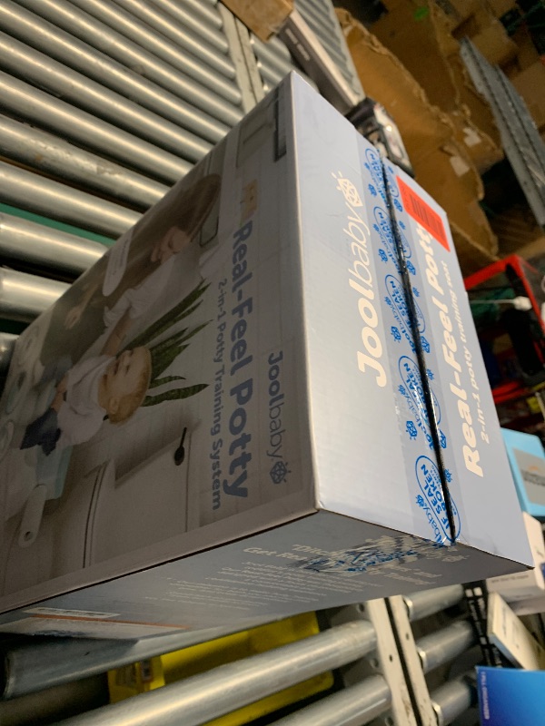 Photo 1 of ***FACTORY SEALED***Real Feel 2-in-1 Potty with Wipes Storage, Flushing Sounds & Disposable Liners - Realistic Toilet - Easy to Clean & Assemble - Jool Baby (Aqua)