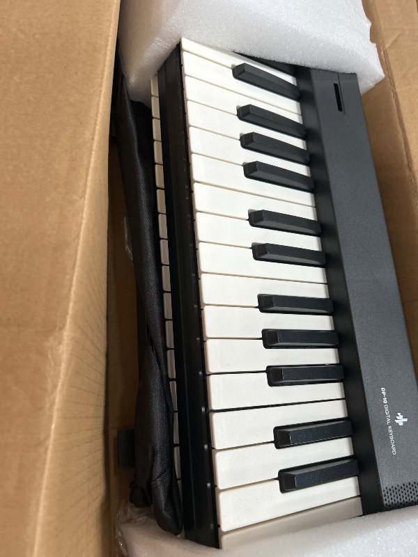 Photo 1 of Donner DP-10 Portable Piano Keyboard 88 Keys for Beginner, Bluetooth Foldable Piano Keyboard with 128 Rhythms&Tones, Chord, Record, Drum Kit, Folding Digital Piano Bundle with Pedal, Piano Bag, Black