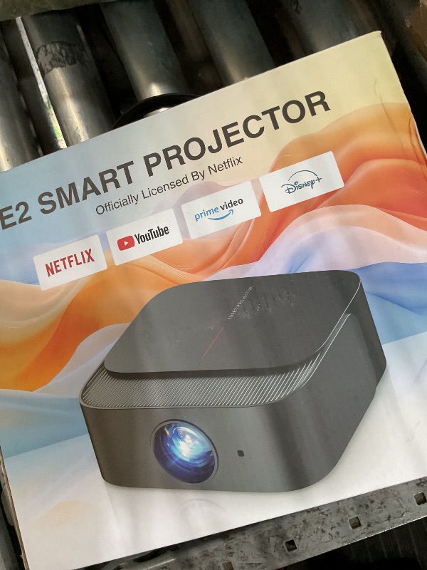 Photo 1 of [2025 Netflix-Licensed | 386+ Built-in Apps] DBPOWER E2 Smart Projector with WiFi and Bluetooth, Mini Projector 4K Support with Netflix, Youtube, Disney+, Hulu, Max, Crunchyroll w Portable Case