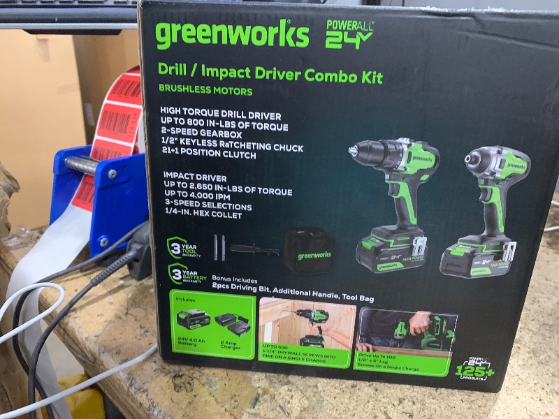Photo 1 of (unfunctional for parts) Greenworks 24V Cordless Brushless 800in-Ibs Drill & 2650 in-ibs Impact Driver Combo Kit with 4.0Ah Battery and Charger