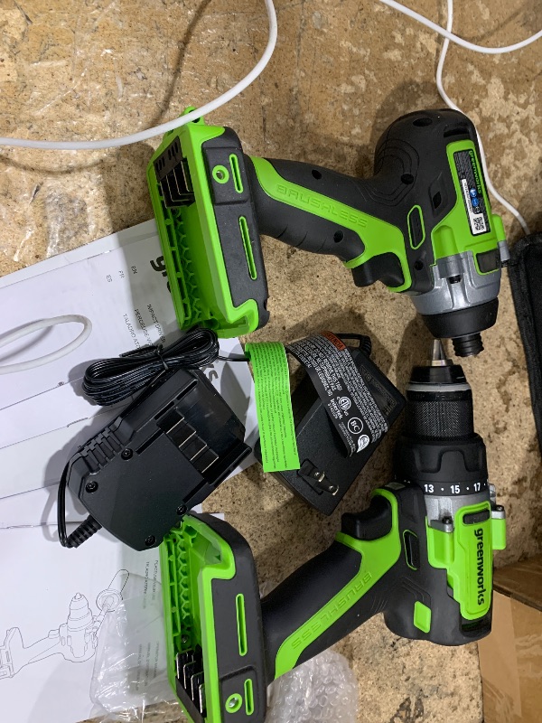 Photo 1 of (unfunctional for parts) Greenworks 24V Cordless Brushless 800in-Ibs Drill & 2650 in-ibs Impact Driver Combo Kit with 4.0Ah Battery and Charger