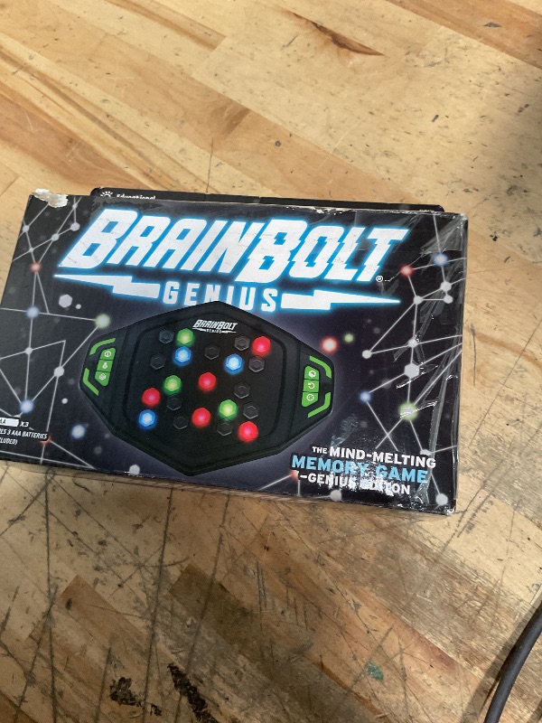 Photo 1 of Educational Insights BrainBolt Genius - Handheld Memory Game, Portable Puzzles for Kids Ages 8-10, Educational Games and Brain Teasers for Kids, Teens, and Adults, Handheld Electronic Games