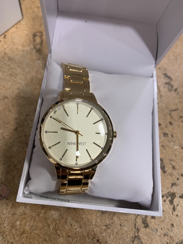 Photo 1 of (needs new battery) Nine West Women's Crystal Accented Gold-Tone Bracelet Watch