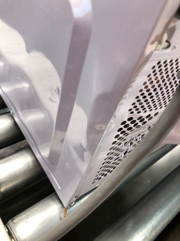 Photo 1 of ***DAMAGED - DENTED - POWERS ON - UNABLE TO TEST FURTHER - SEE PICTURES***
Danby DBMW0721BWW 0.7 cu. ft White Countertop Microwave