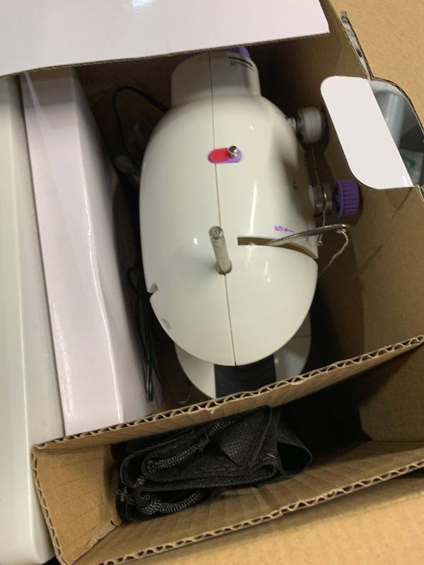 Photo 1 of (see all images) Magicfly Mini Sewing Machine with Extension Table, Dual Speed Portable Sewing Machine for Beginners with Light, Sewing Kit