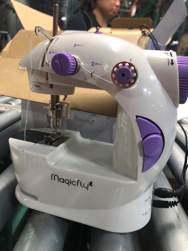 Photo 1 of (see all images) Magicfly Mini Sewing Machine with Extension Table, Dual Speed Portable Sewing Machine for Beginners with Light, Sewing Kit