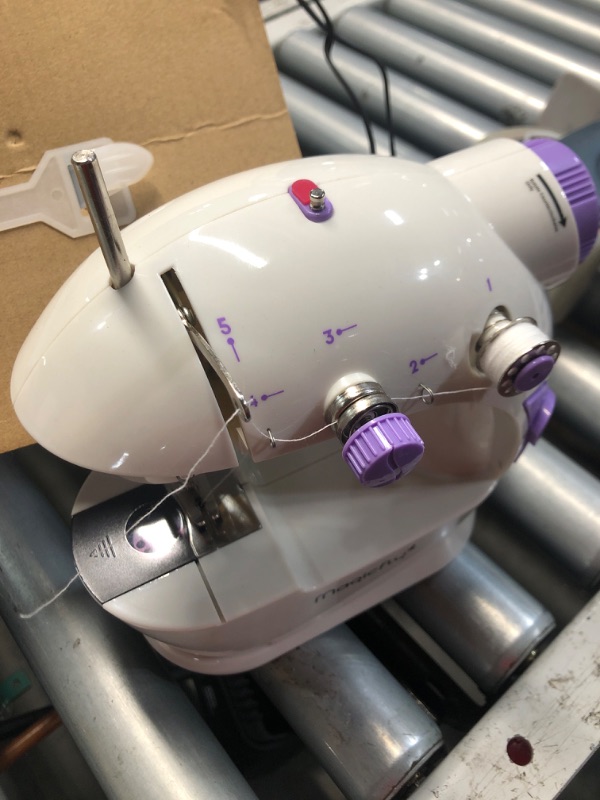 Photo 1 of (see all images) Magicfly Mini Sewing Machine with Extension Table, Dual Speed Portable Sewing Machine for Beginners with Light, Sewing Kit