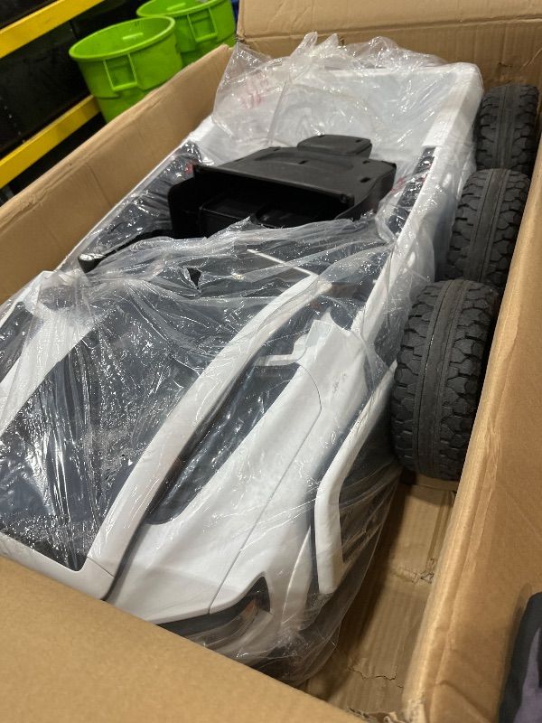 Photo 1 of ** PARTS ONLY - SEE NOTES ** Ram 24V Ride on Car for Big Kids, Ram 1500 RHO Battery Powered Ride on Toy with Remote Control, Electric Car for Kids Toddlers 3-8, 4 Wheelers, White