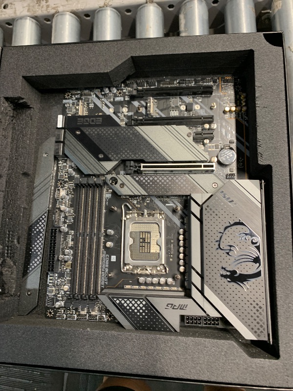 Photo 1 of ***(PARTS ONLY/ MISSING PARTS/ NON FUNCTIONAL)***MSI MPG Z690 Carbon WiFi Gaming Motherboard (ATX, 12th Gen Intel Core, LGA 1700 Socket, DDR5, PCIe 4, CFX, M.2 Slots, Wi-Fi 6E) 
