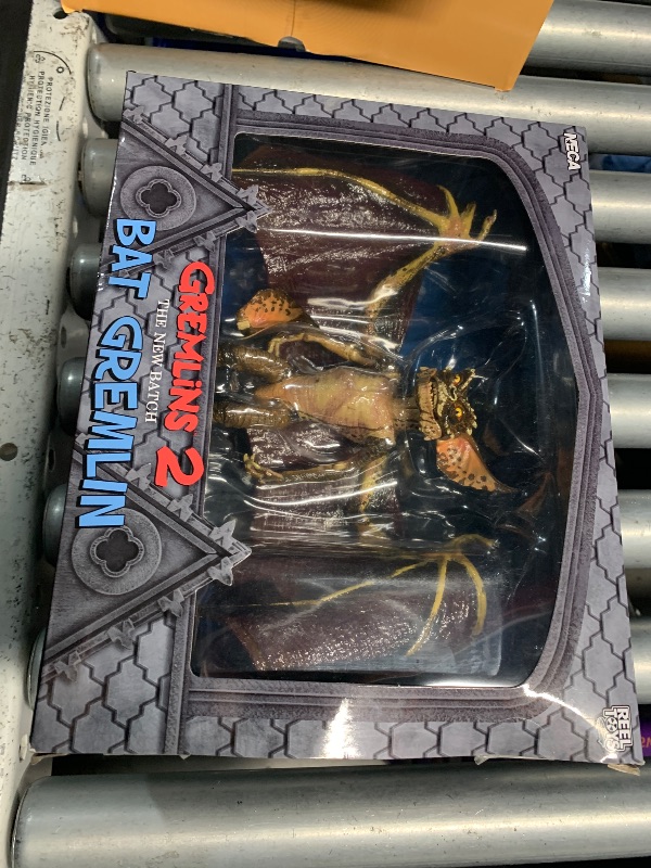 Photo 1 of ***(MINOR DAMAGE/ SEE NOTES)***NECA Gremlins 2 Deluxe Bat Gremlin 6-Inch Action Figure with 18-Inch Wingspan and Display Stand