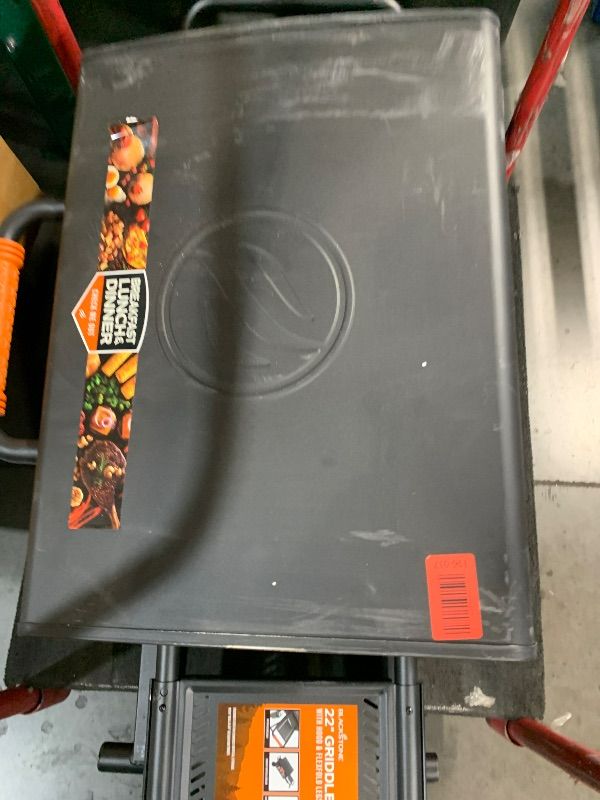 Photo 1 of ***MISSING THE LEGS***
BLACKSTONE 22” On The Go Scissor-Leg Griddle with Two Burners -Stainless Steel Gas Griddle with Hood, Wheels, Side Shelf –Heavy Duty Outdoor Stainless Steel Griddle for Backyard, Patio Camping –1935