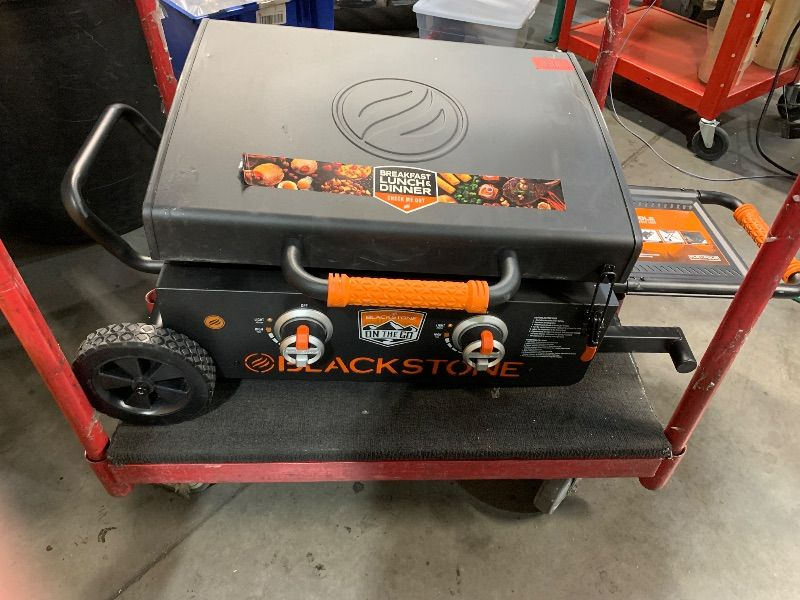 Photo 1 of ***MISSING THE LEGS***
BLACKSTONE 22” On The Go Scissor-Leg Griddle with Two Burners -Stainless Steel Gas Griddle with Hood, Wheels, Side Shelf –Heavy Duty Outdoor Stainless Steel Griddle for Backyard, Patio Camping –1935