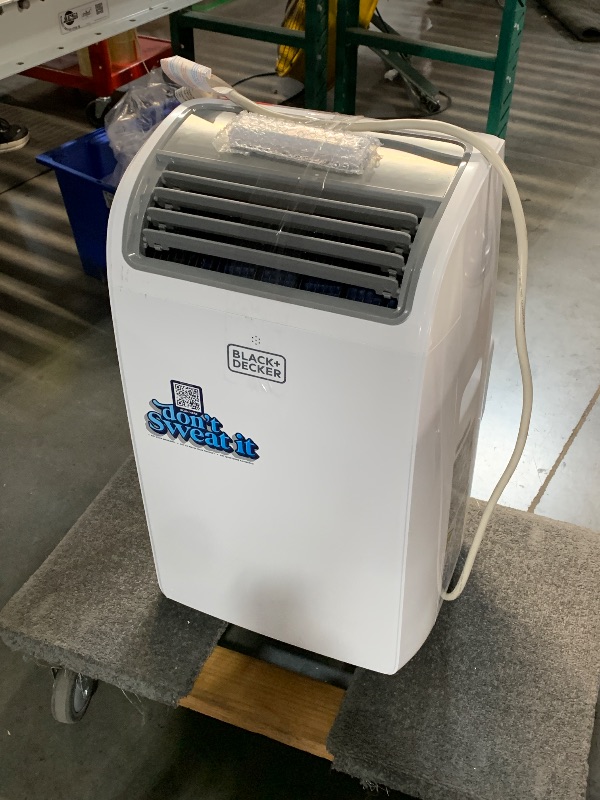 Photo 1 of ***ONLY INCLUDES REMOTE*** BLACK+DECKER Smart Portable Air Conditioner, 14,000 BTU, BPACT14WT, White
***ALLOW UPRIGHT FOR 24 Hrs BEFORE USE***