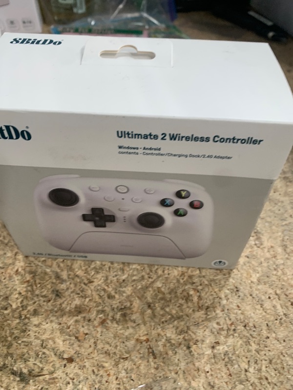 Photo 1 of 8Bitdo Ultimate 2 Wireless Gaming Controller with TMR Joysticks, Switchable Hall Effect/Tactile Triggers, 8Speed Wireless Tech, Charging Dock, RGB Fire Ring for PC & Android - White