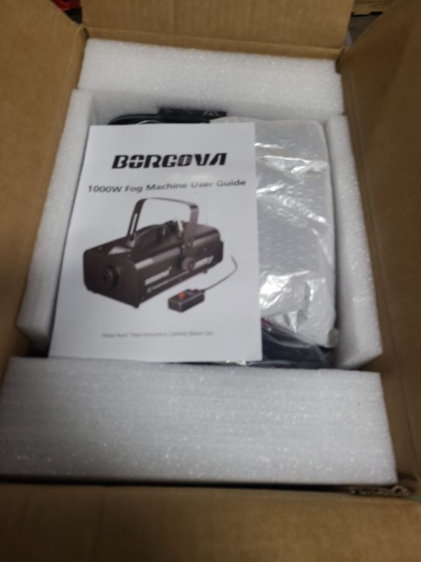 Photo 1 of 1000W Fog Machine with Timer, Wireless Remote, and Manual Control - Ideal for Halloween, Parties, Stage Performances, Concerts, and Clubs