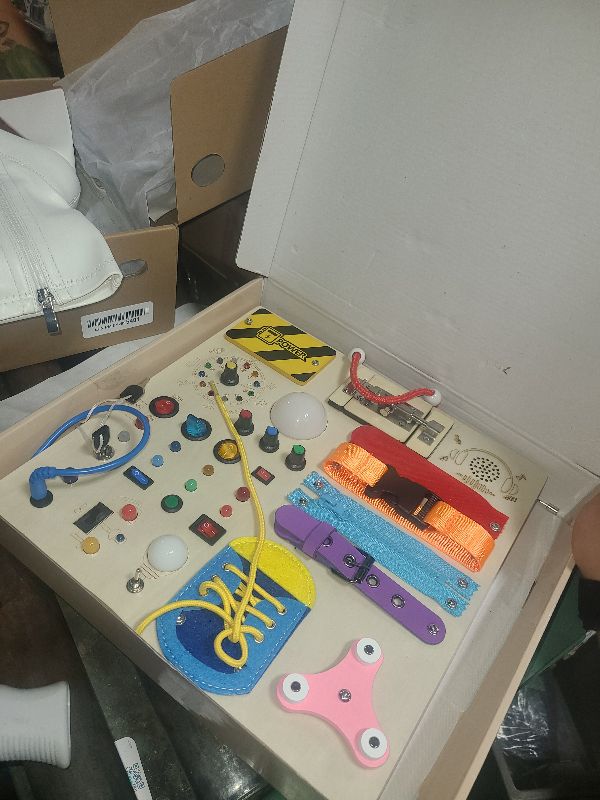 Photo 1 of 23 in 1 Busy Board Montessori Toys for 1-3 Year Old Wooden Learning Educational Toy for Toddlers with 15 Switches, 26 LED Lights, Music Boxes, Locks,Zippers Toddler Sensory Toys for Soothing A Baby