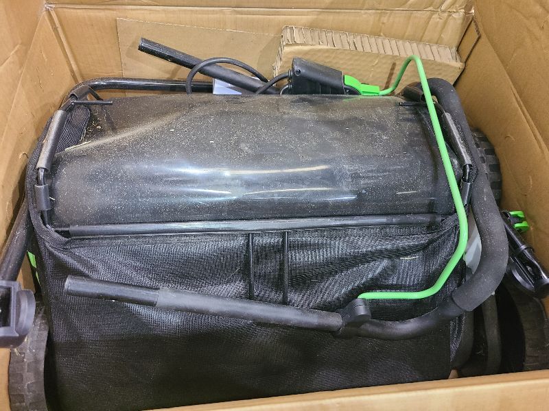 Photo 1 of 16-Inch 15.5 Amp 2-In-1 Electric Dethatcher and Scarifier with 14.5-Gallon Remover