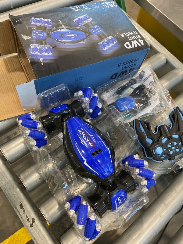 Photo 1 of *Missing Parts - Check clerk notes*
Teensmagic Best Birthday Gifts for Boys & Girls Aged 6-12 - Gesture Sensing RC Stunt Car, 2.4Ghz Hand-Controlled Remote Control Twist Cars, 4WD All-Terrain Adaptability