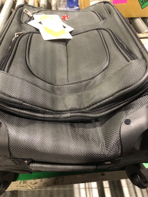 Photo 1 of **DENT ON BOTTOM OF SUITCASE-SEE PHOTO**
SwissGear Sion Softside Expandable Luggage, Dark Grey, Carry-On 21-Inch