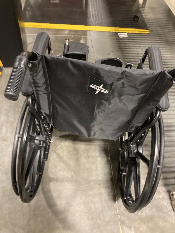 Photo 1 of ** INCLUDED MANUAL / UNPACKAGED ** Medline Premium UltraLightweight Wheelchair with FullLength FlipBack Arms and Elevating Leg Rests for Extra Comfort 18” Seat, No, 1 Count