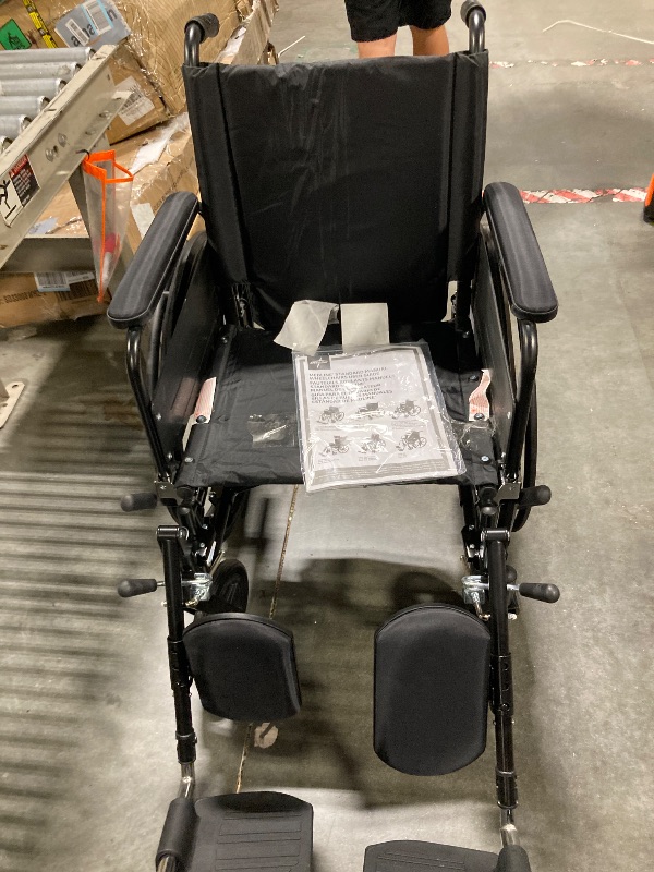 Photo 1 of ** INCLUDED MANUAL / UNPACKAGED ** Medline Premium UltraLightweight Wheelchair with FullLength FlipBack Arms and Elevating Leg Rests for Extra Comfort 18” Seat, No, 1 Count