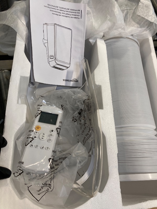 Photo 1 of ** USED/ TESTED FUNCTIONAL/ INCLUDED MANUAL CONTROL AND ACCESORIES **Amazon Basics 3-In-1 Portable Air Conditioner, 12000 BTU (ASHRAE), Cools Up to 550 Sqf, Portable AC with Cool/Dry (Dehumidifier)/Fan-Only Functions, Auto Mode, Sleep Mode, Timer, White