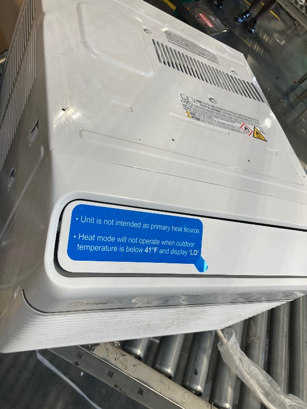 Photo 1 of ** DAMAGE MAJOR DIRTY / VERY USED** Midea 12,000 BTU Smart Inverter Air Conditioner Window Unit with Heat and Dehumidifier – Cools up to 550 Sq. Ft., Energy Star Rated, Quiet Operation, Electronic Controls, Remote Control, White