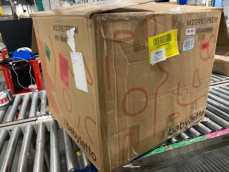 Photo 1 of ** NEW** Babyletto Cali Pillowback Swivel Glider in Performance Beach Eco-Weave, Water Repellent & Stain Resistant, Greenguard Gold and CertiPUR-US Certified