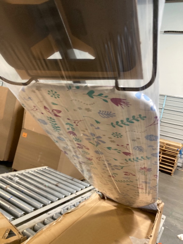 Photo 1 of ** BRAND NEW ITEM **Amazon Basics Ironing Board Medium 122x38 cm with Iron Rest H Shape, Black, Floral